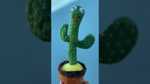 Танцующий кактус игрушка. Музыкальный кактус. С неоновой подсветкой и повторением слов..