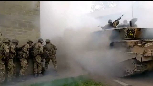 British Challenger 2 tank rolling coal on Infantry ??? смотреть онлайн
