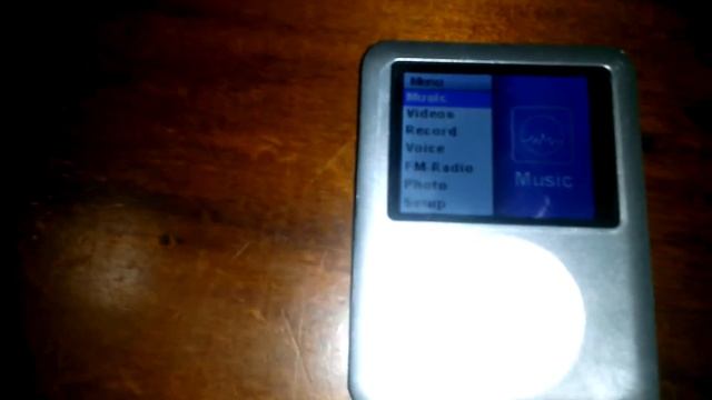 MP4 Player 16Gb Preto - 3º geração смотреть онлайн