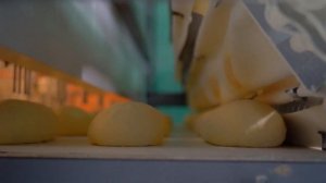 Видеосъемка на хлебозаводе оборудования для выпекания, нарезки и упаковки хлеба. ОДО Рокинтехинвест