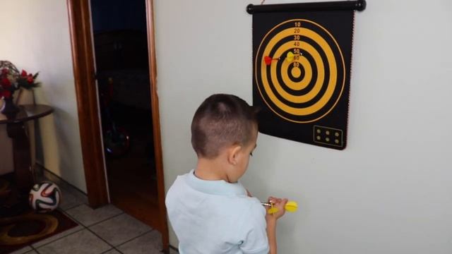 Joshua Playing With Funny Darts Game for kids смотреть онлайн