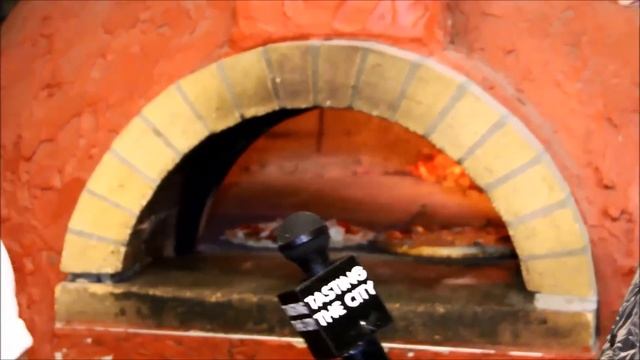 Tasting the City watches Fireside Pizza Restaurant Make Pizza in a Wood Firing Brick Oven смотреть онлайн