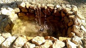 Фонтан из старой ванны