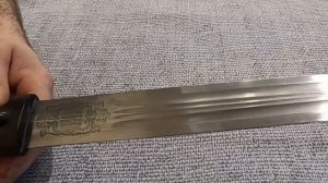 Черный казачий кинжал, и Шашка азиатская в серебре.