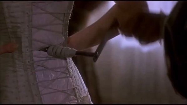 Georgina Cates corset lacing scene - Stiff Upper Lips (1997)