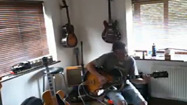 1935 Gibson Super 400 смотреть онлайн