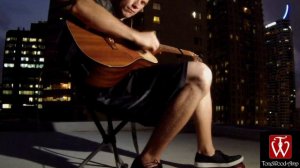 Playing guitar on a Skyscraper