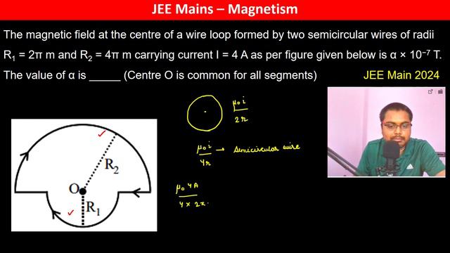 The magnetic field at the centre of a wire loop formed by two semicircular wires of radii R1 = 2π m смотреть онлайн