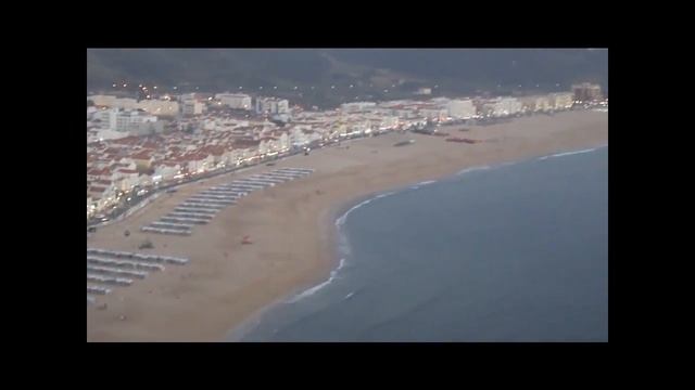 Nazare Portugal View from Sitio - Looking down at the amazing beach and onto the ocean смотреть онлайн