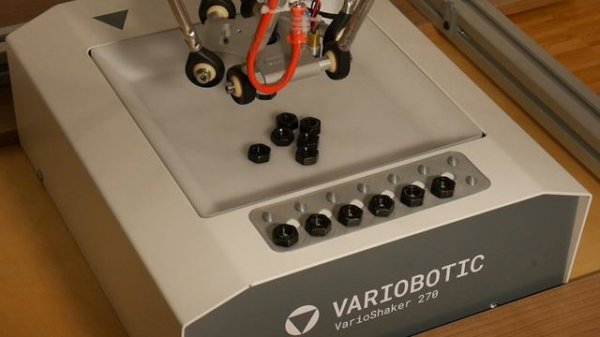Low cost part separation using a vibration table with a delta robot and motion controller