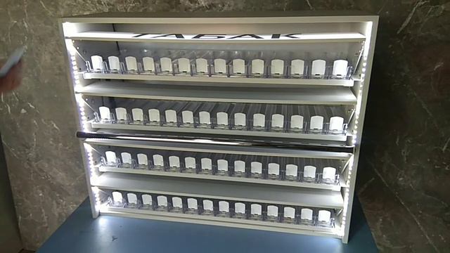 Диспенсер для продажи сигарет с четырьмя складными створками смотреть онлайн