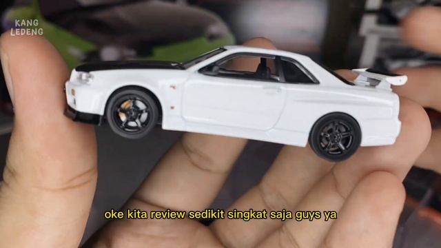 Unboxing Inno64 Nissan Skyline GT-R (R34) V-Spec II N1 White / Carbon Food смотреть онлайн