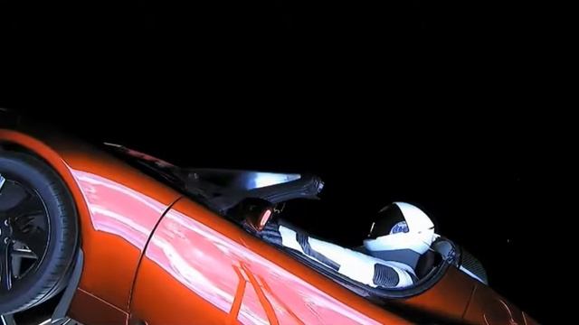 Starman Traveling in Space in a Tesla Roadster Aboard the Falcon Heavy Orbiter смотреть онлайн