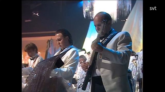 Lotten Andersson & Magnus Sjögren - Va' E' Du (Melodifestivalen 1996) смотреть онлайн