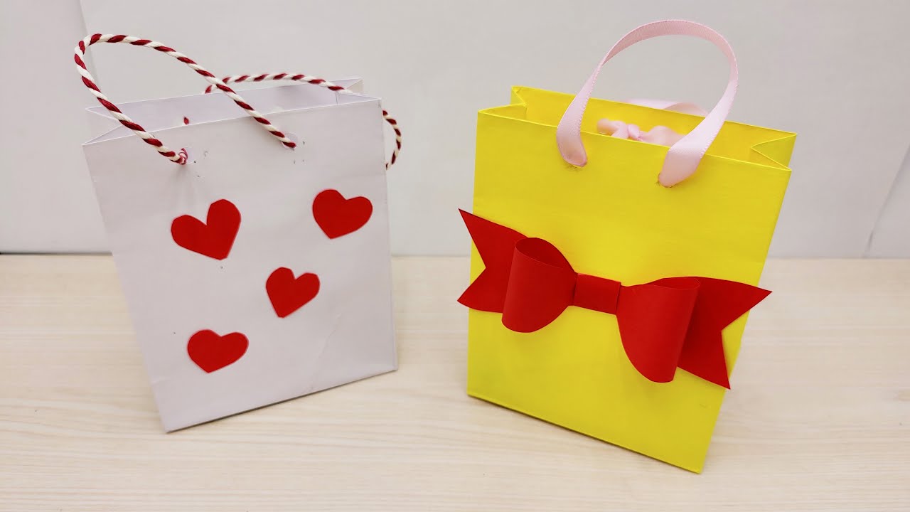 Подарочный пакет из бумаги / Как сделать пакет из бумаги / Упаковочный пакет из бумаги / Пакет смотреть онлайн