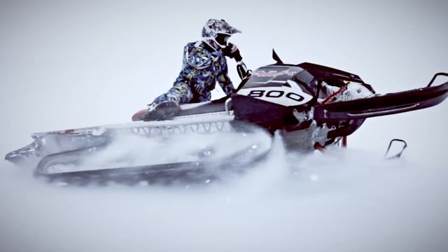 Snowmobiling In Mountains. Lago-Naki