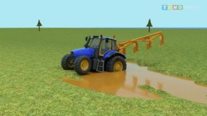 Трактор для детей, вспахивающий застрявшую в грязи землю | Использование сельскохозяйственного