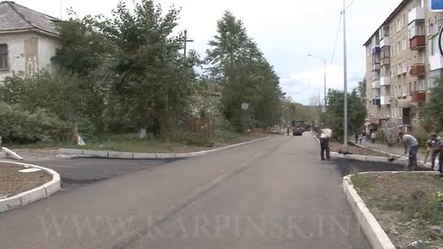 Укладка асфальта по улице Лесопильной смотреть онлайн