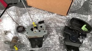 Установка электро-замка  и кнопки багажника на Mitsubishi Lancer X