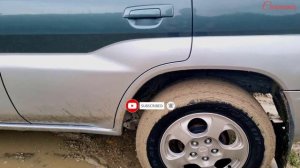 driving test car in the mud stuck jeep mitsubishi pajero pedalpumping