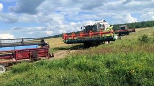 выезд с поля комбайнов агрос и класс