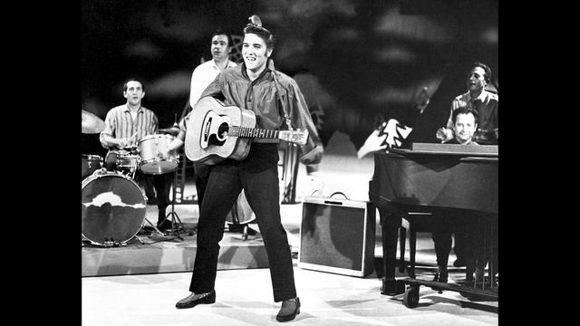 Элвис Пресли.