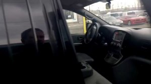 Hyundai H-1 (Grand Starex) чёрный микроавтобус 5 дверей, 2012 г.,