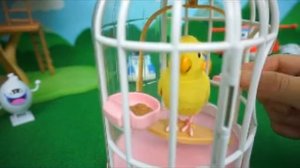Интерактивная игрушка.  Говорящий попугай в клетке. Йоко.