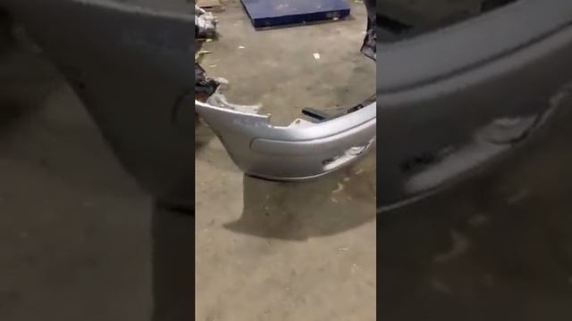 Бампер передний Mitsubishi Carisma рест. 2000