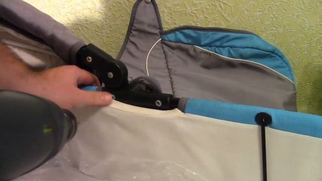 Регулятор - шарнир капюшона детской коляски