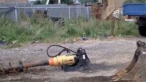 Экскаватор-погрузчик TEREX 860 - работа ковшом