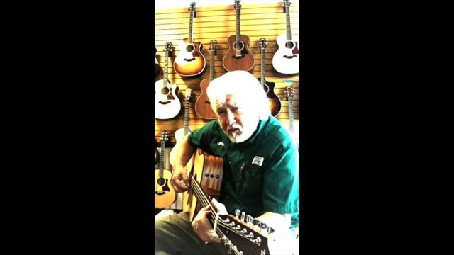 At the music store. Playing a $749.00 Taylor 12 string смотреть онлайн