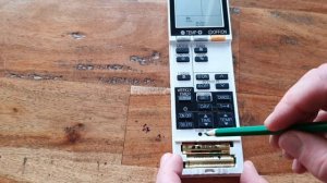 How to replace batteries in a Mitsubishi Electric Heat Pump/Air Conditioner