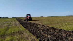 Кировец К-739 Ст на пахоте залежных земель с плугом Русич ПНУУ 8х40