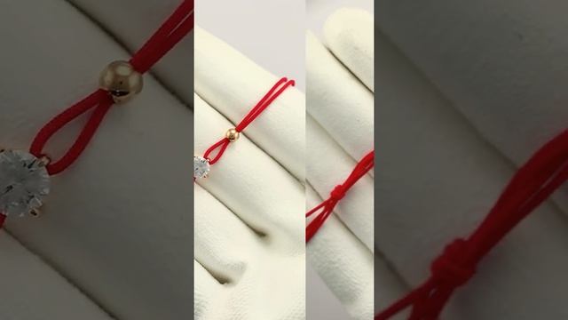 Браслет красная нить с золотыми вставками и фианитом ювелирного завода Голден Глоб смотреть онлайн