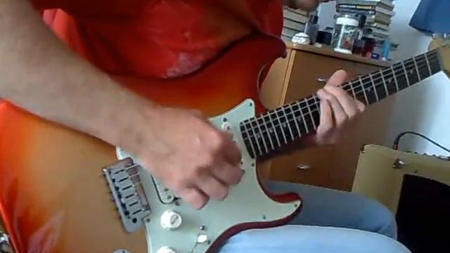 Fender American Deluxe Stratocaster Sunset Metallic HSS смотреть онлайн