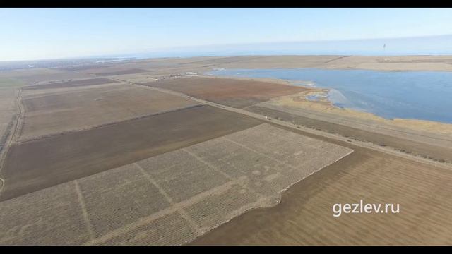 Продажа участков сельхозназначения в районе оз. Панское, рядом с пгт. Черноморское с высоты полета смотреть онлайн