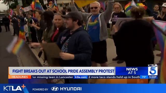 Fists fly at elementary school Pride event protest смотреть онлайн