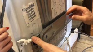 Как снять транспортировочные болты со стиральной машины Haier HWD80-B14686