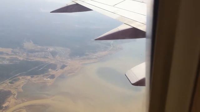 Flying over Yuzhno Sakhalinsk, Russia towards Sapporo, Japan. смотреть онлайн