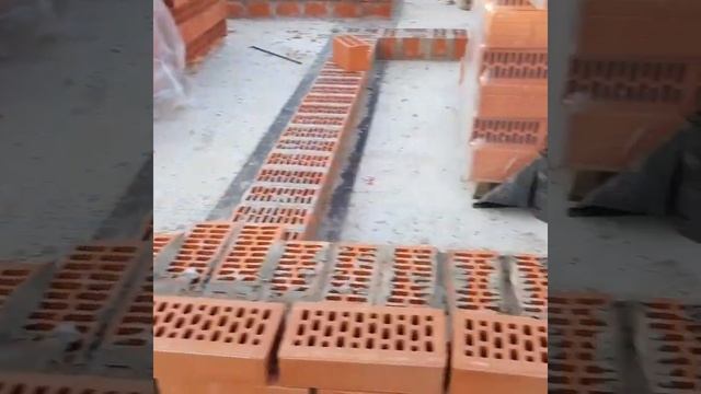 Облицовка одновременно с кладкой стен