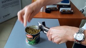 Безопасная открывалка для консервных банок