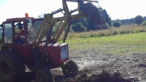 Т-25 траншея фронтальным погрузчиком