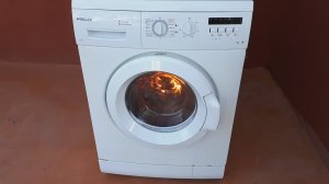 Печь из стиральной машины как идея декора для сада и дачи