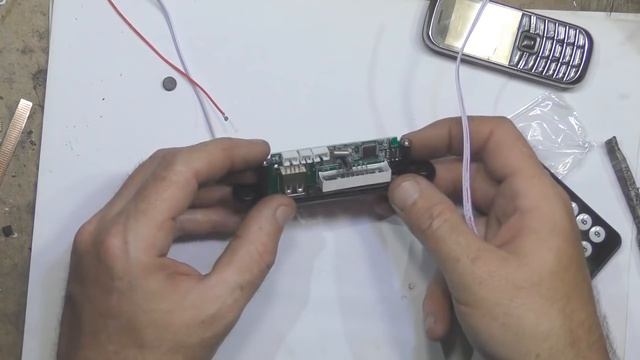 MP3 плеер с FM приемником и пультом. смотреть онлайн