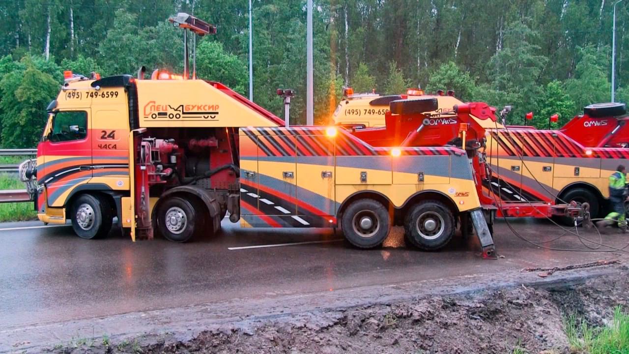 Грузовой эвакуатор Домодедово. Постановка на колеса груженого цементовоза смотреть онлайн