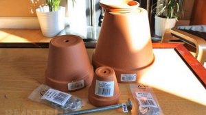 Вечный обогреватель из свечи и цветочных горшков.