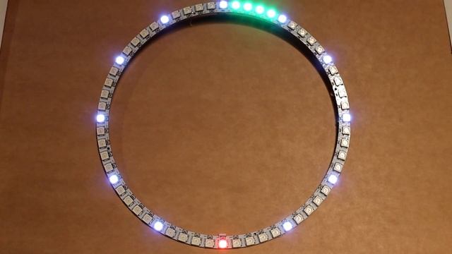 Часы на микроконтроллере ESP8266 и кольце из адресных светодиодов WS2812. Программа для Arduino IDE смотреть онлайн