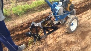 Поворотный плуг для мотоблока