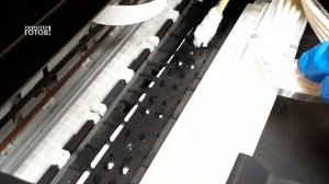 Принтер EPSON пачкает лист бумаги с обратной стороны. Чёрные полосы при печати.